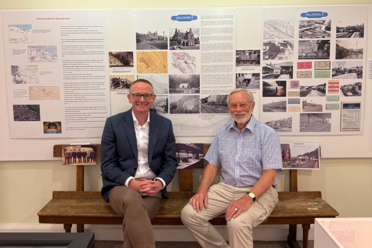 Robert McKendrick from Old Gala Club with MP John Lamont at teh exhibition The Old Gala Club Goes by Train